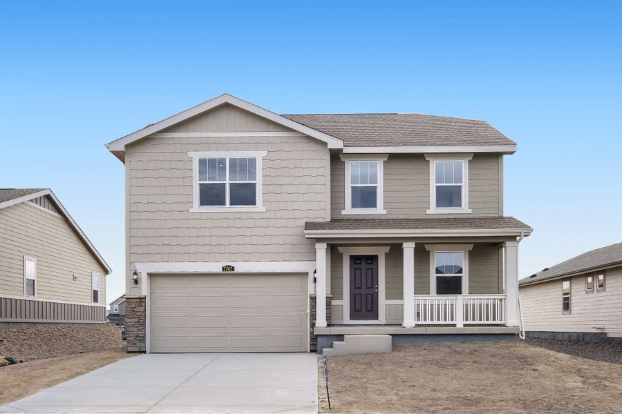 Front exterior of a new home in Percheron, Colorado Springs, CO, highlighting curb appeal (Image 1). Front exterior of a new home in Percheron, Colorado Springs, CO, highlighting curb appeal (Image 1).