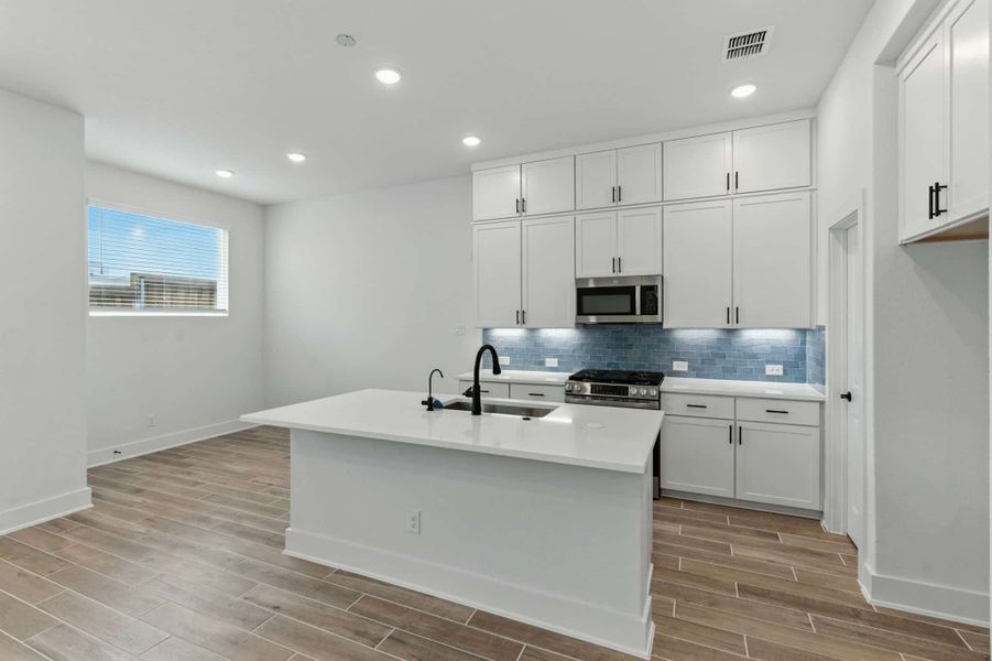 Furnished interior view inside a new home in Rose Hill, San Antonio (Image 8).