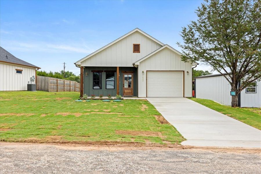Front exterior of a new home in , Granbury, TX, highlighting curb appeal (Image 19). Front exterior of a new home in , Granbury, TX, highlighting curb appeal (Image 19).
