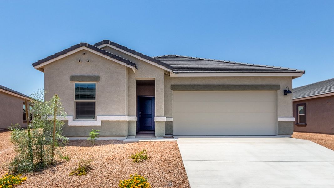 Front exterior of a new home in Barnett Village, Marana, AZ, highlighting curb appeal (Image 2).