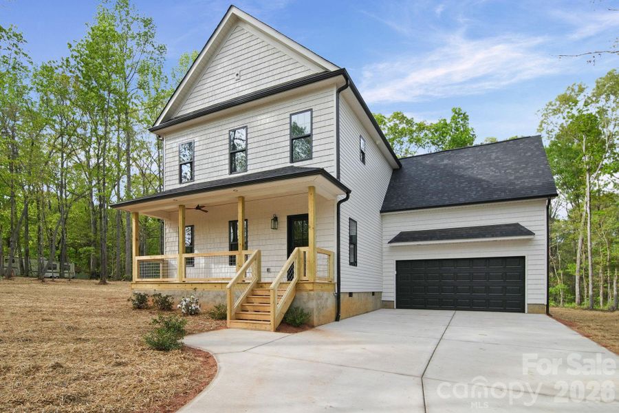 Front exterior of a new home in , Lincolnton, NC, highlighting curb appeal (Image 26). Front exterior of a new home in , Lincolnton, NC, highlighting curb appeal (Image 26).
