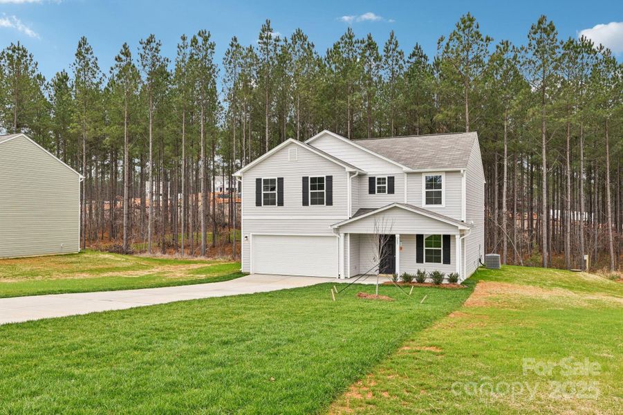 Front exterior of a new home in The Pines at Stoney Point, Lexington, NC, highlighting curb appeal (Image 8).