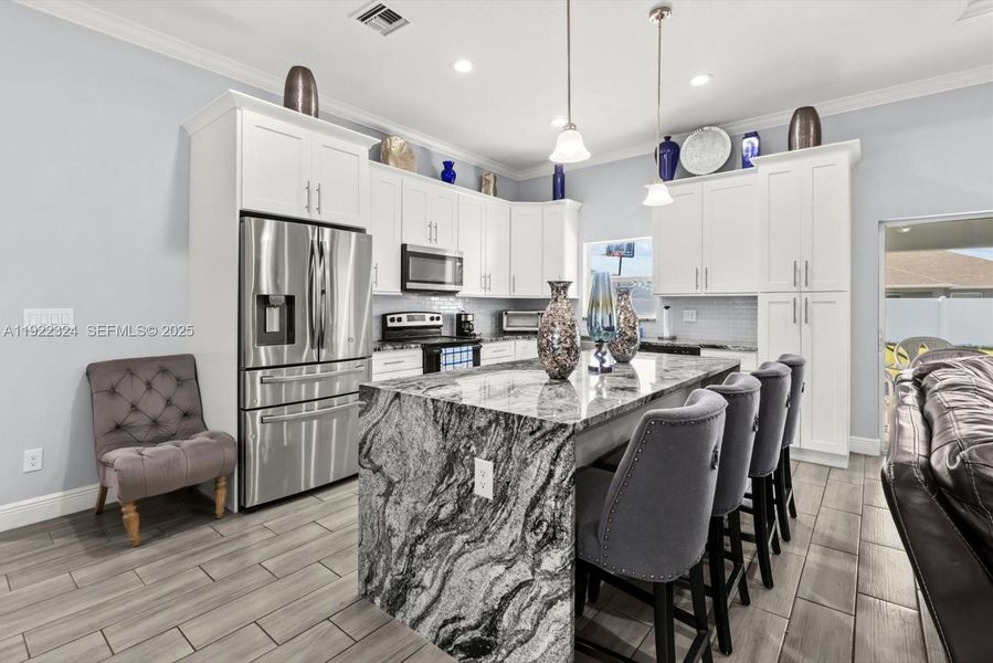 Furnished interior view inside a new home in , Port St. Lucie (Image 6).