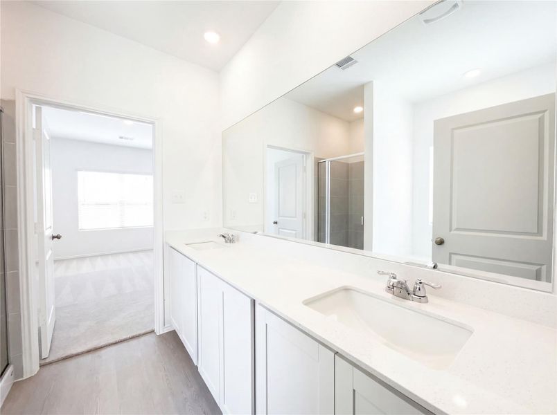 Furnished interior view inside a new home in The Colony, Bastrop (Image 9).