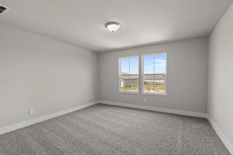 Representative unfurnished interior of a home built from the Majestic View II by View Homes in Skybrooke, Live Oak (Image 18).