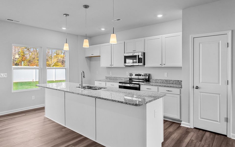 Furnished interior view inside a new home in Hanes Lake, Winston-Salem (Image 8). Furnished interior view inside a new home in Hanes Lake, Winston-Salem (Image 8).