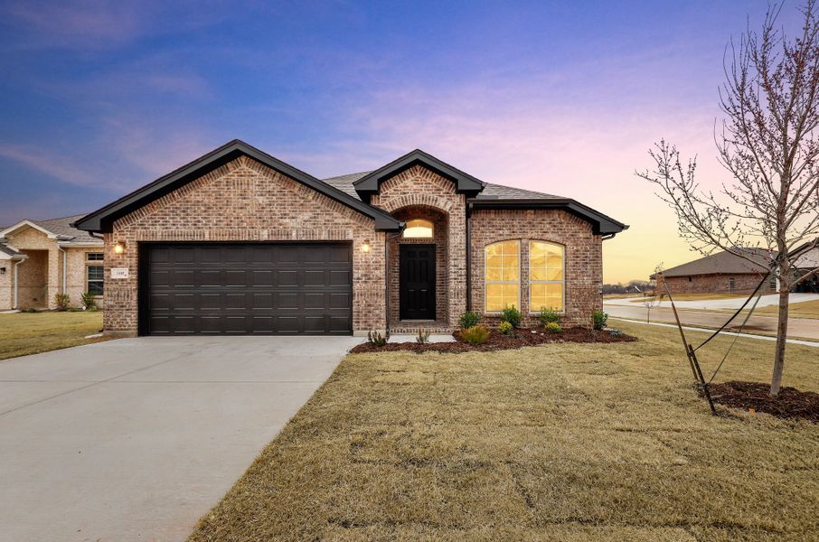 Representative exterior photo of a completed home built from the Devin by Cheldan Homes in Sunset Ridge, Keene, TX (Image 26). Representative exterior photo of a completed home built from the Devin by Cheldan Homes in Sunset Ridge, Keene, TX (Image 26).