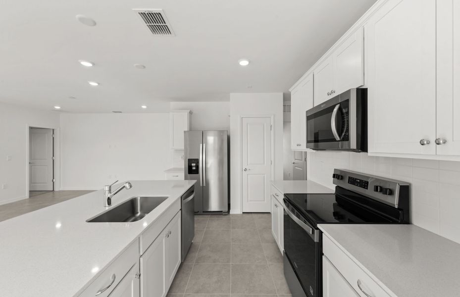 Furnished interior view inside a new home in Whispering Lakes, Lehigh Acres (Image 8).