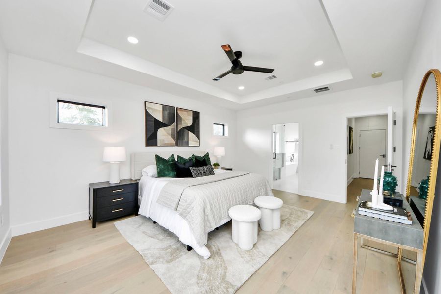 Every element of this primary bedroom is curated to provide a perfect balance of relaxation, elegance, and high-end design, making it the ultimate retreat at the heart of the home.