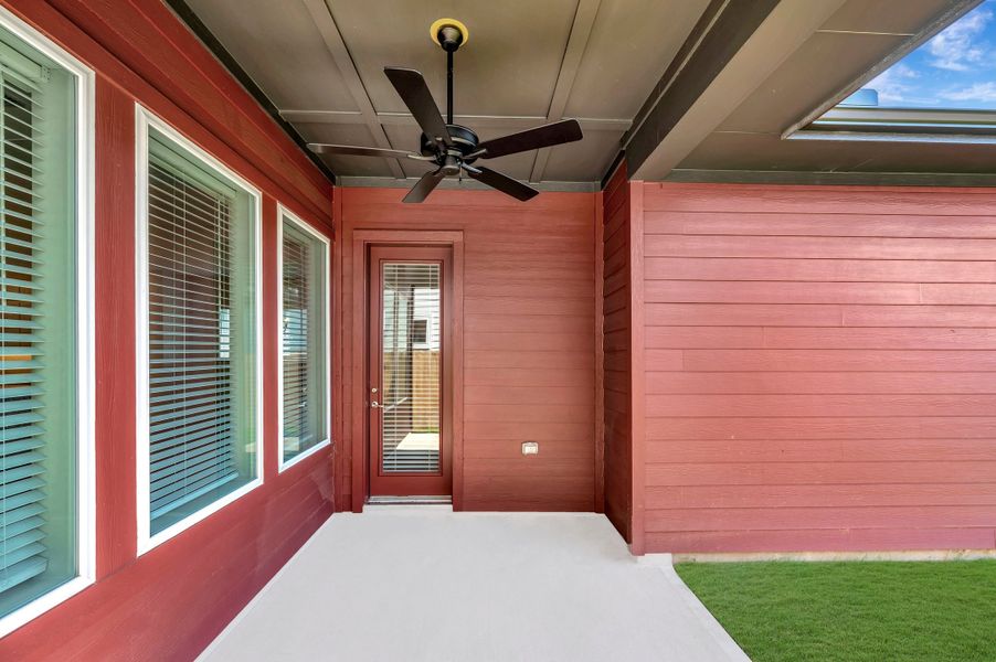 Exterior details and patio area of a home in Elyson - Grove Row Collection, Katy (Image 3).