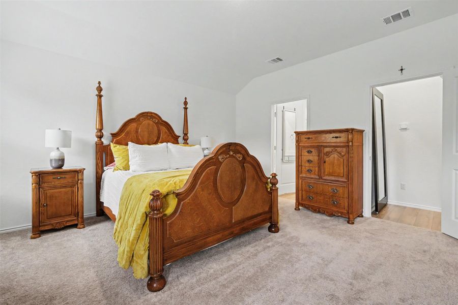 Plush carpet flooring complements crisp white walls