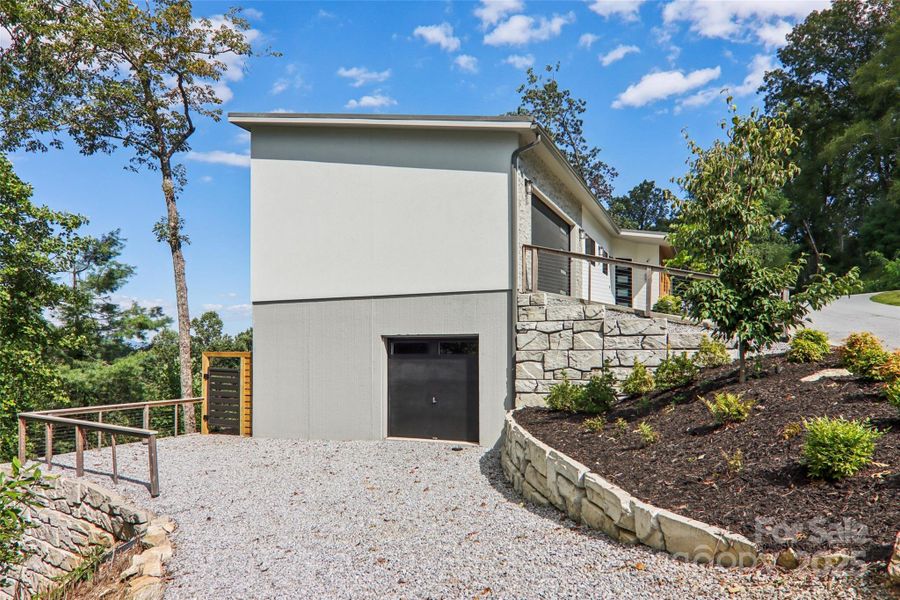 Front exterior of a new home in , Hendersonville, NC, highlighting curb appeal (Image 21).