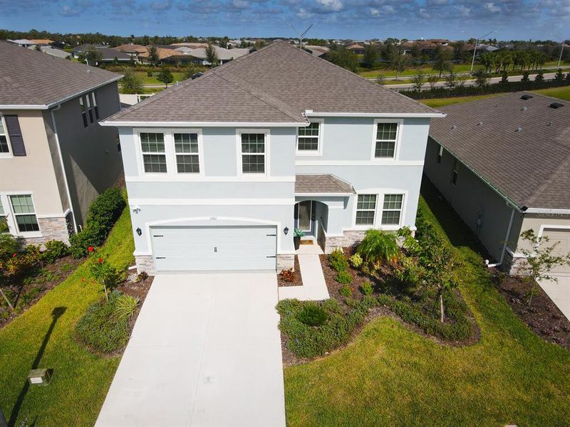 Front exterior of a new home in Solera at Lakewood Ranch, Lakewood Ranch, FL, highlighting curb appeal (Image 31).