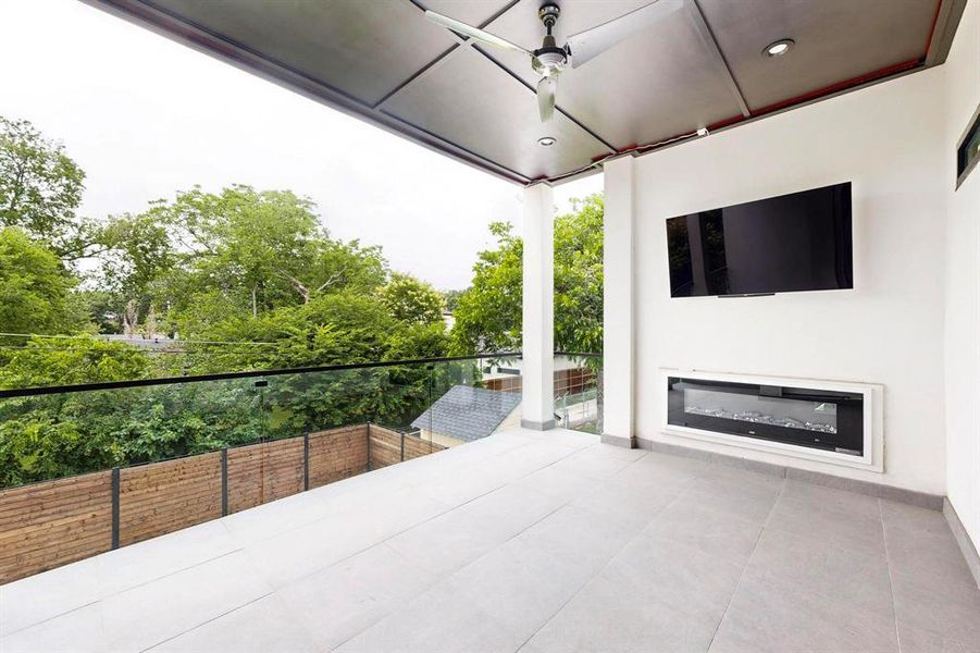 Patio / terrace featuring a ceiling fan Patio / terrace featuring a ceiling fan
