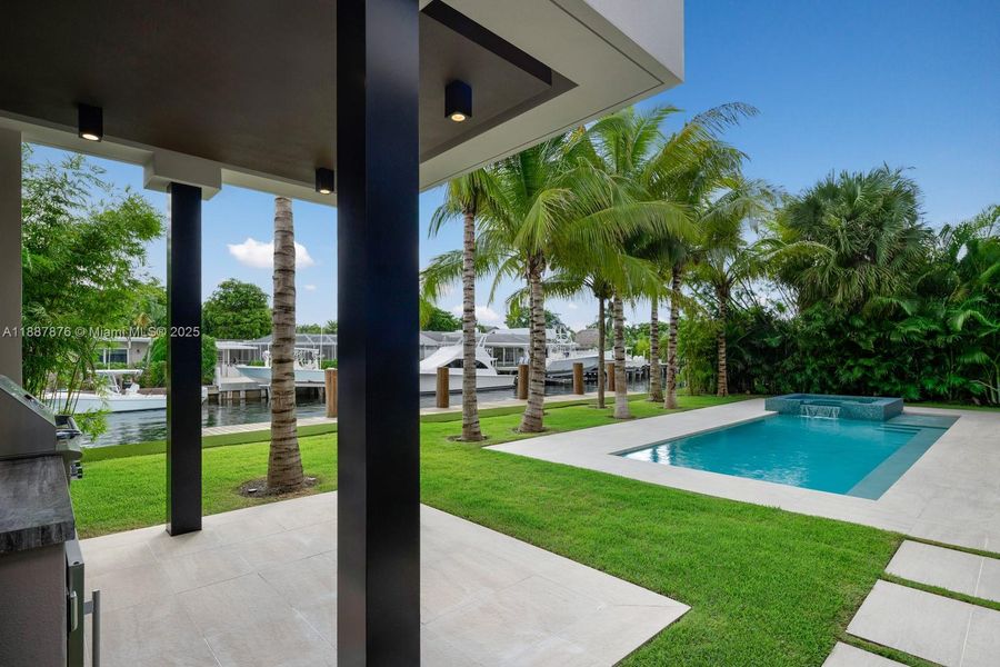 Exterior details and patio area of a home in , North Miami (Image 2).