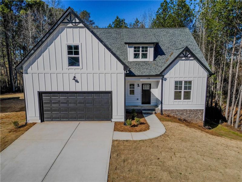 Front exterior of a new home in , Villa Rica, GA, highlighting curb appeal (Image 16). Front exterior of a new home in , Villa Rica, GA, highlighting curb appeal (Image 16).
