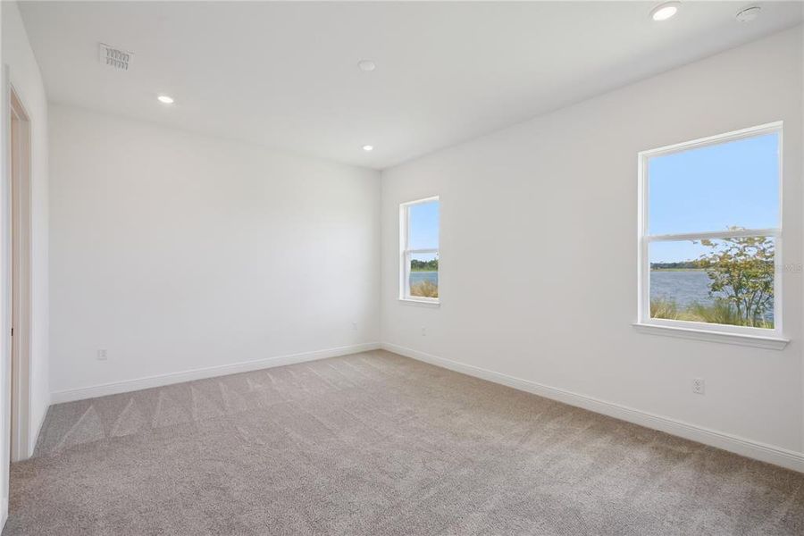 Spacious, unfurnished interior of a new home in Laureate Park, Orlando (Image 23).