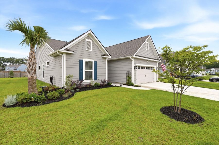 Front exterior of a new home in , Johns Island, SC, highlighting curb appeal (Image 22). Front exterior of a new home in , Johns Island, SC, highlighting curb appeal (Image 22).