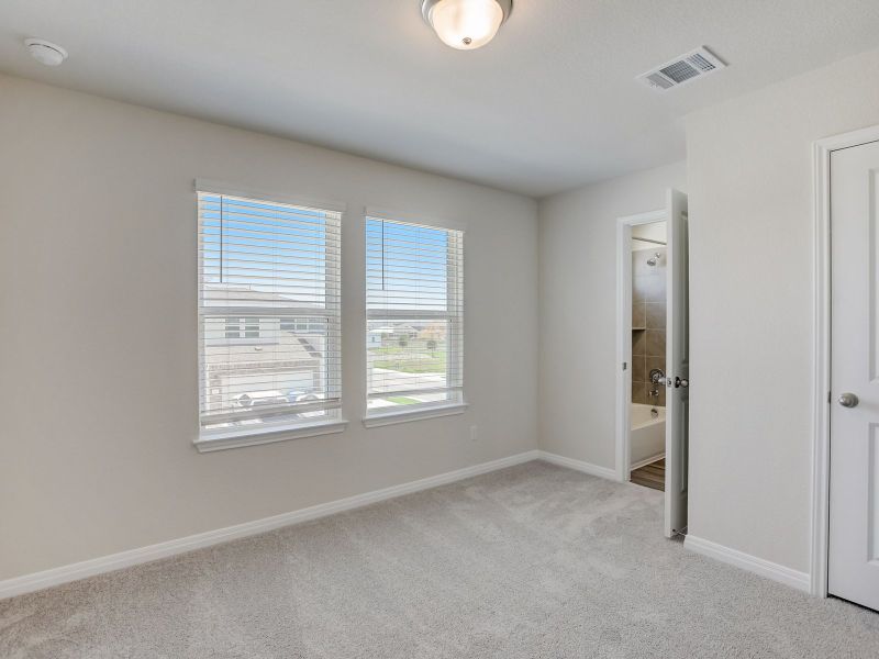 The two secondary bedrooms are connected by a jack-and-jill bathroom.