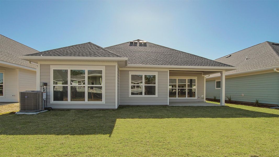 Representative exterior photo of a completed home built from the Lily by D.R. Horton in Breakfast Point East Phase II, Panama City Beach, FL (Image 22).