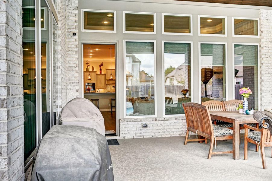 Exterior details and patio area of a home in Artavia 70′, Conroe (Image 4).