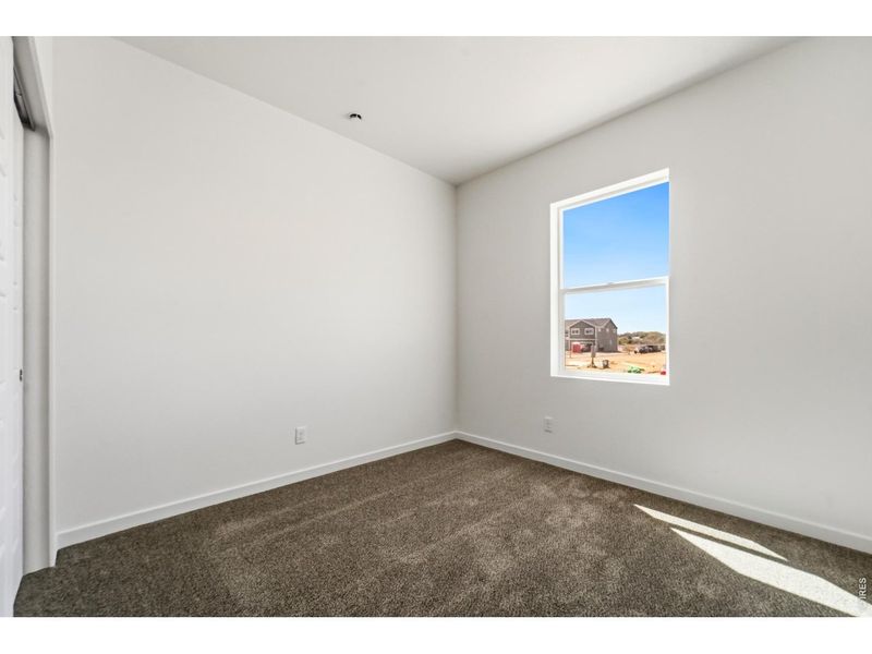Spacious, unfurnished interior of a new home in Liberty Draw, Evans (Image 11).