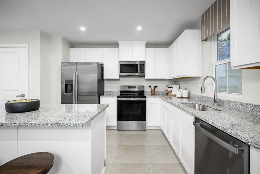 Furnished interior view inside a new home in Seminole Palms Townhomes, Palm Coast (Image 3).