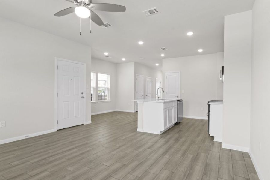 Spacious, unfurnished interior of a new home in Whisper Valley, Manor (Image 8).