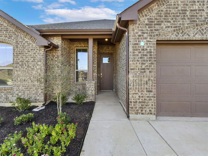 Exterior details and patio area of a home in Pecan Creek Crossing, Valley View (Image 2). Exterior details and patio area of a home in Pecan Creek Crossing, Valley View (Image 2).
