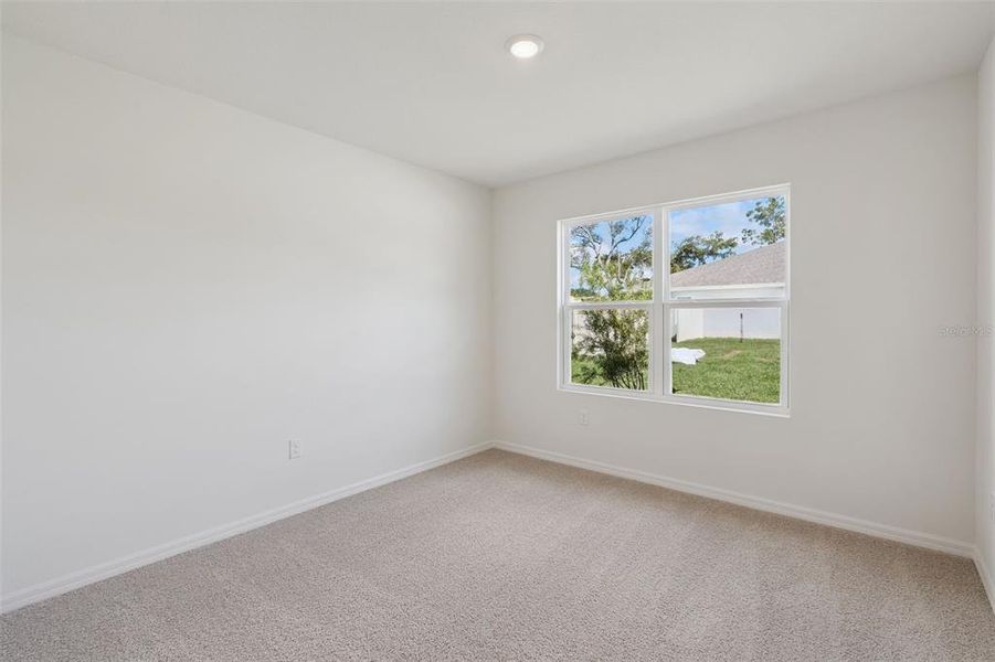 Spacious, unfurnished interior of a new home in Wexford Cove, Ormond Beach (Image 10).
