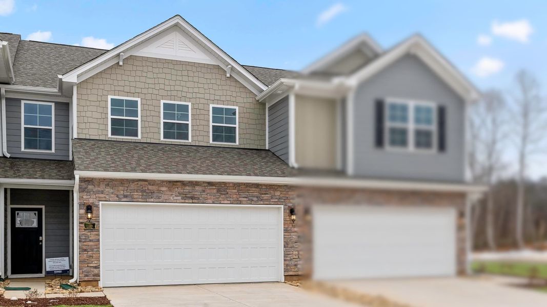 Front exterior of a new home in Lybrook Village, Advance, NC, highlighting curb appeal (Image 2). Front exterior of a new home in Lybrook Village, Advance, NC, highlighting curb appeal (Image 2).