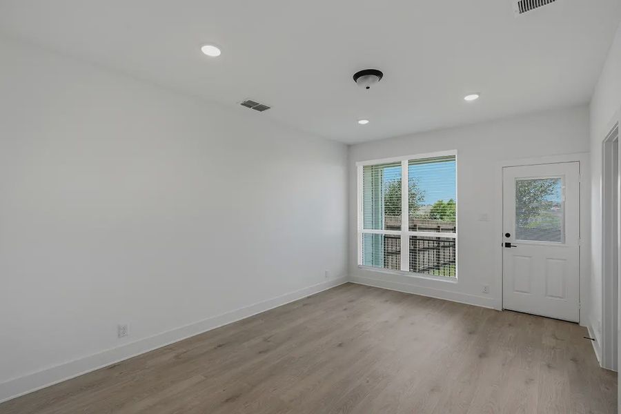 Representative unfurnished interior of a home built from the Athena by Chesmar Homes in Prominence Urban, San Antonio (Image 36).