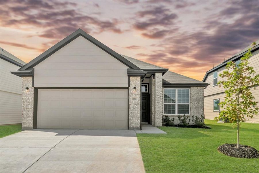 Front exterior of a new home in Retreat at Fossil Creek, Fort Worth, TX, highlighting curb appeal (Image 1). Front exterior of a new home in Retreat at Fossil Creek, Fort Worth, TX, highlighting curb appeal (Image 1).
