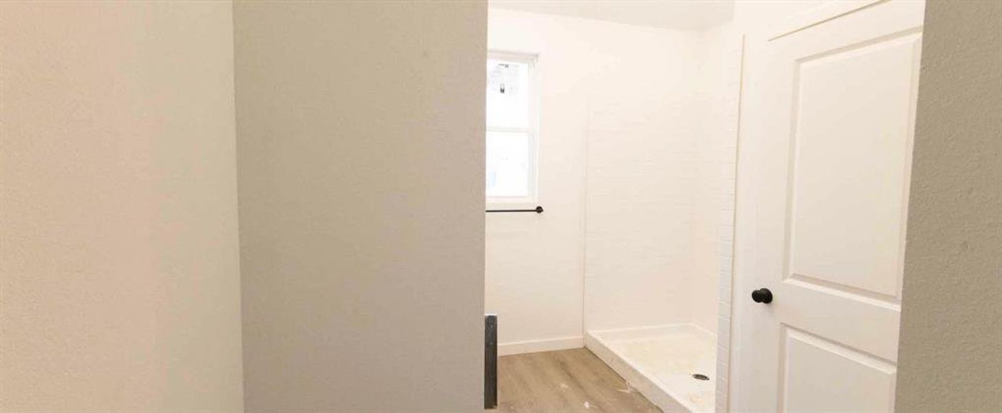 Primary Bathroom Construction Progress featuring the Noir Collection Primary Bathroom Construction Progress featuring the Noir Collection