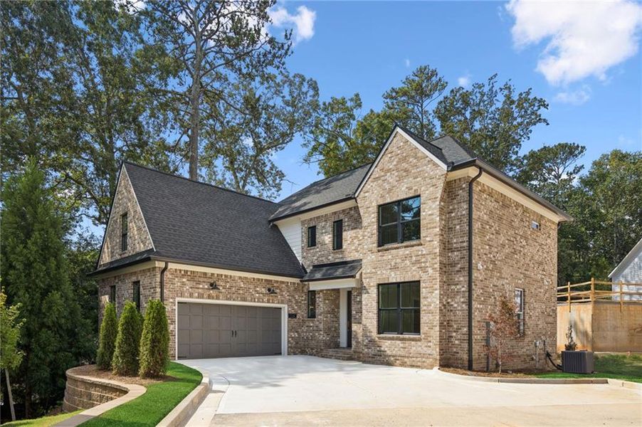 Front exterior of a new home in , Roswell, GA, highlighting curb appeal (Image 2). Front exterior of a new home in , Roswell, GA, highlighting curb appeal (Image 2).