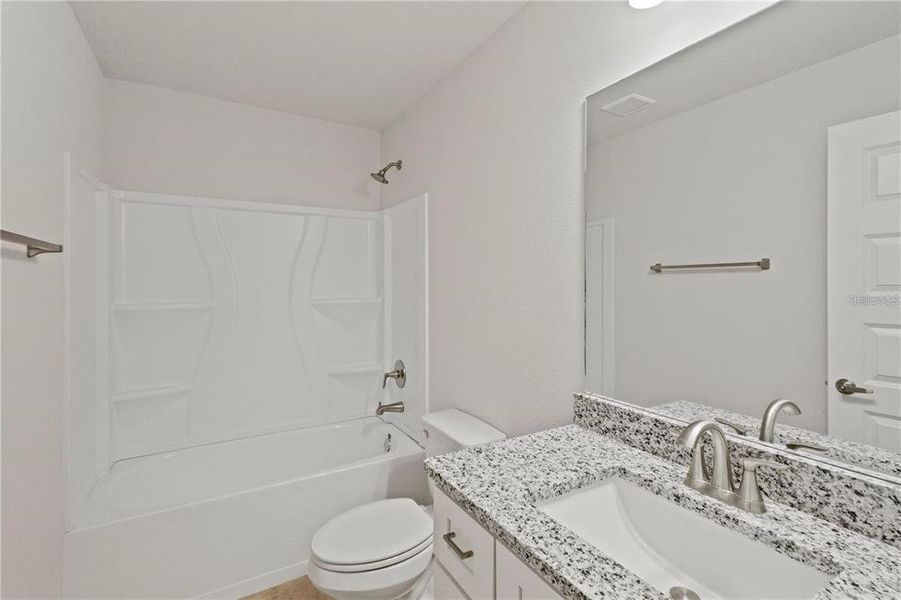 Stock photo. Home will be similar colors and material will vary.