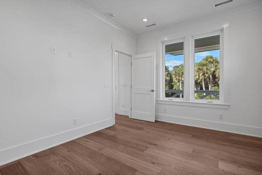 Spacious, unfurnished interior of a new home in , Edisto Beach (Image 49).