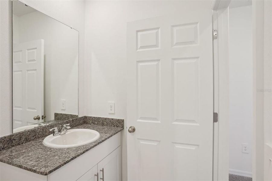 Furnished interior view inside a new home in Lake Deer Estates - Signature Series, Poinciana (Image 5). Furnished interior view inside a new home in Lake Deer Estates - Signature Series, Poinciana (Image 5).