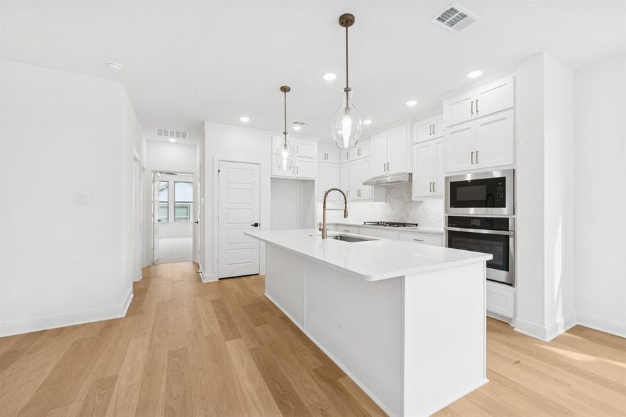 Furnished interior view inside a new home in Hillside at Las Colinas, Irving (Image 6).