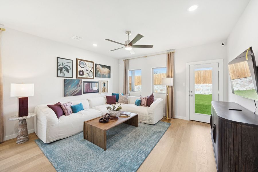 Living Room in a Belmont Magnolia Model Home in Aubrey TX by Trophy Signature Homes