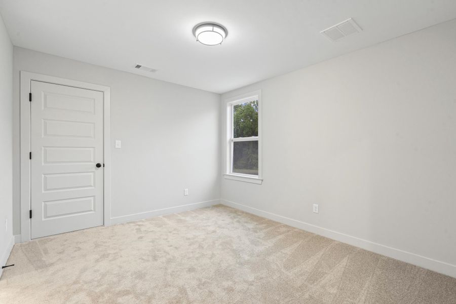 Neutral wall tones and plush carpeting define this interior space Neutral wall tones and plush carpeting define this interior space
