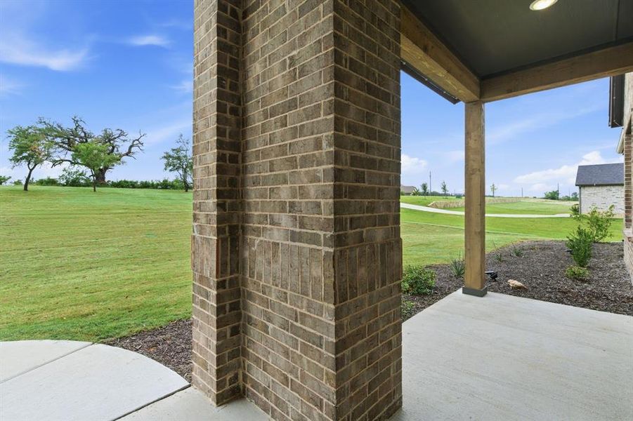 Exterior details and patio area of a home in Gatlin Ranch, Springtown (Image 21).
