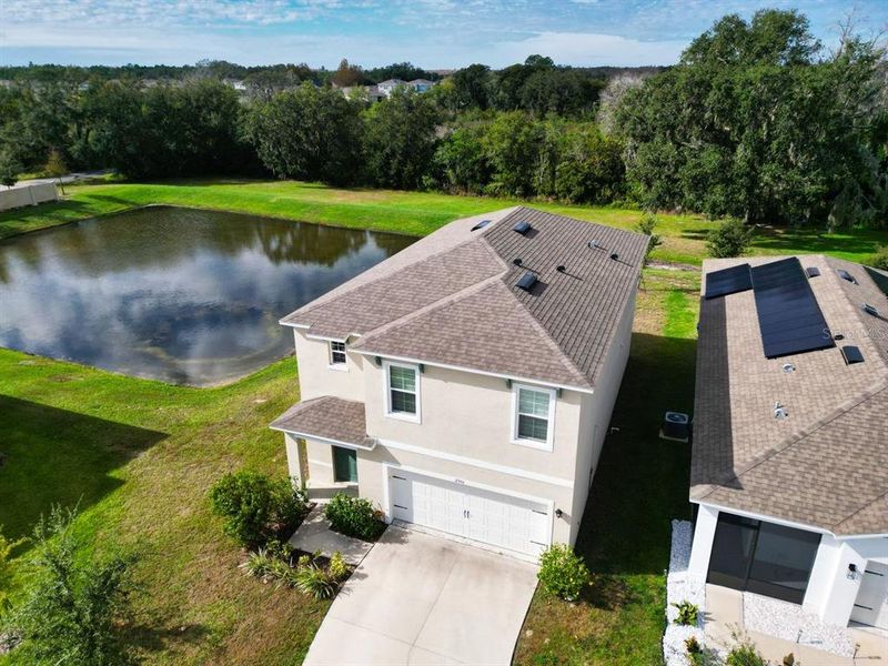 Front exterior of a new home in Cascades, Davenport, FL, highlighting curb appeal (Image 1). Front exterior of a new home in Cascades, Davenport, FL, highlighting curb appeal (Image 1).