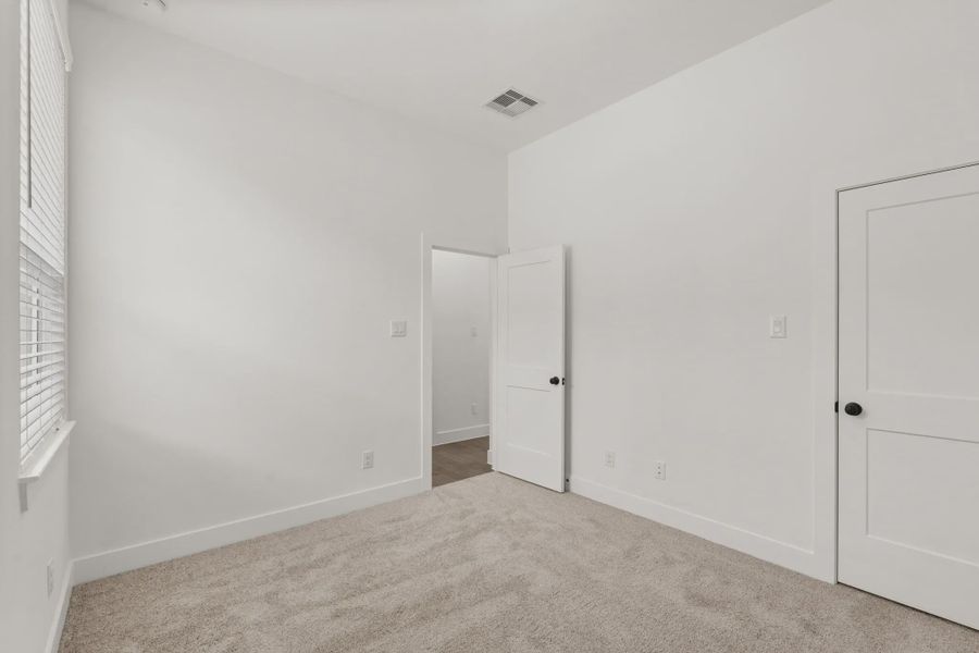 Representative unfurnished interior of a home built from the Rowen by Chesmar Homes in Brookewater 45's, Rosenberg (Image 14).