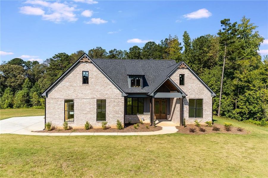 Front exterior of a new home in , Dallas, GA, highlighting curb appeal (Image 22).