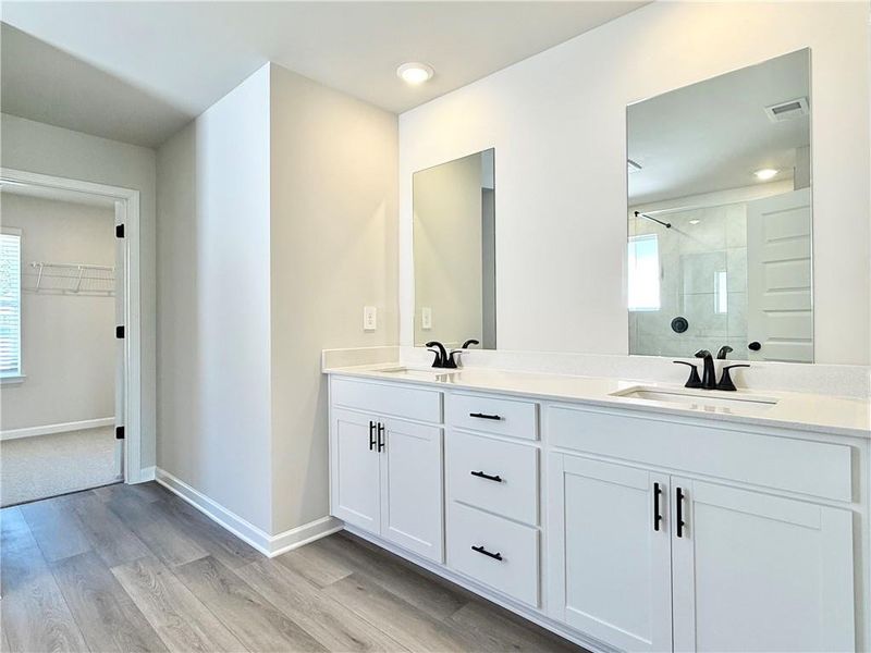 Furnished interior view inside a new home in Vines at Mill Creek - Estate Series, Braselton (Image 7). Furnished interior view inside a new home in Vines at Mill Creek - Estate Series, Braselton (Image 7).