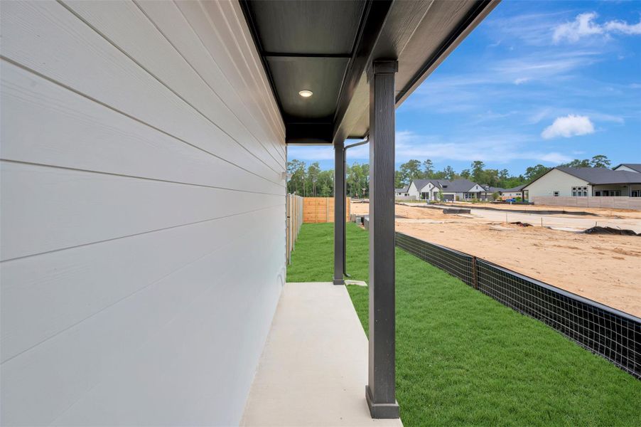 Exterior details and patio area of a home in Two Step Farm - Cottages Row Collection, Montgomery (Image 3). Exterior details and patio area of a home in Two Step Farm - Cottages Row Collection, Montgomery (Image 3).