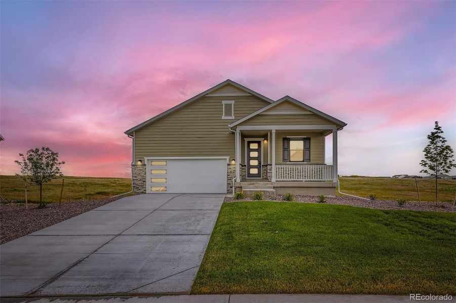 Front exterior of a new home in , Elizabeth, CO, highlighting curb appeal (Image 18).