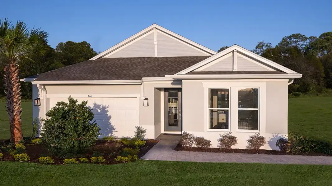 Representative exterior photo of a completed home built from the Longboat by Taylor Morrison in Azure at Solaeris, Port St. Lucie, FL (Image 24).