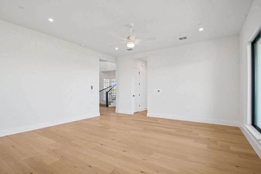 Spacious, unfurnished interior of a new home in Milky Way at River Place, Austin (Image 17).